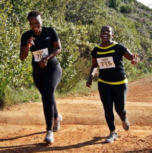 At the finish line of a 10km trail race. I swear she smiled the whole way.